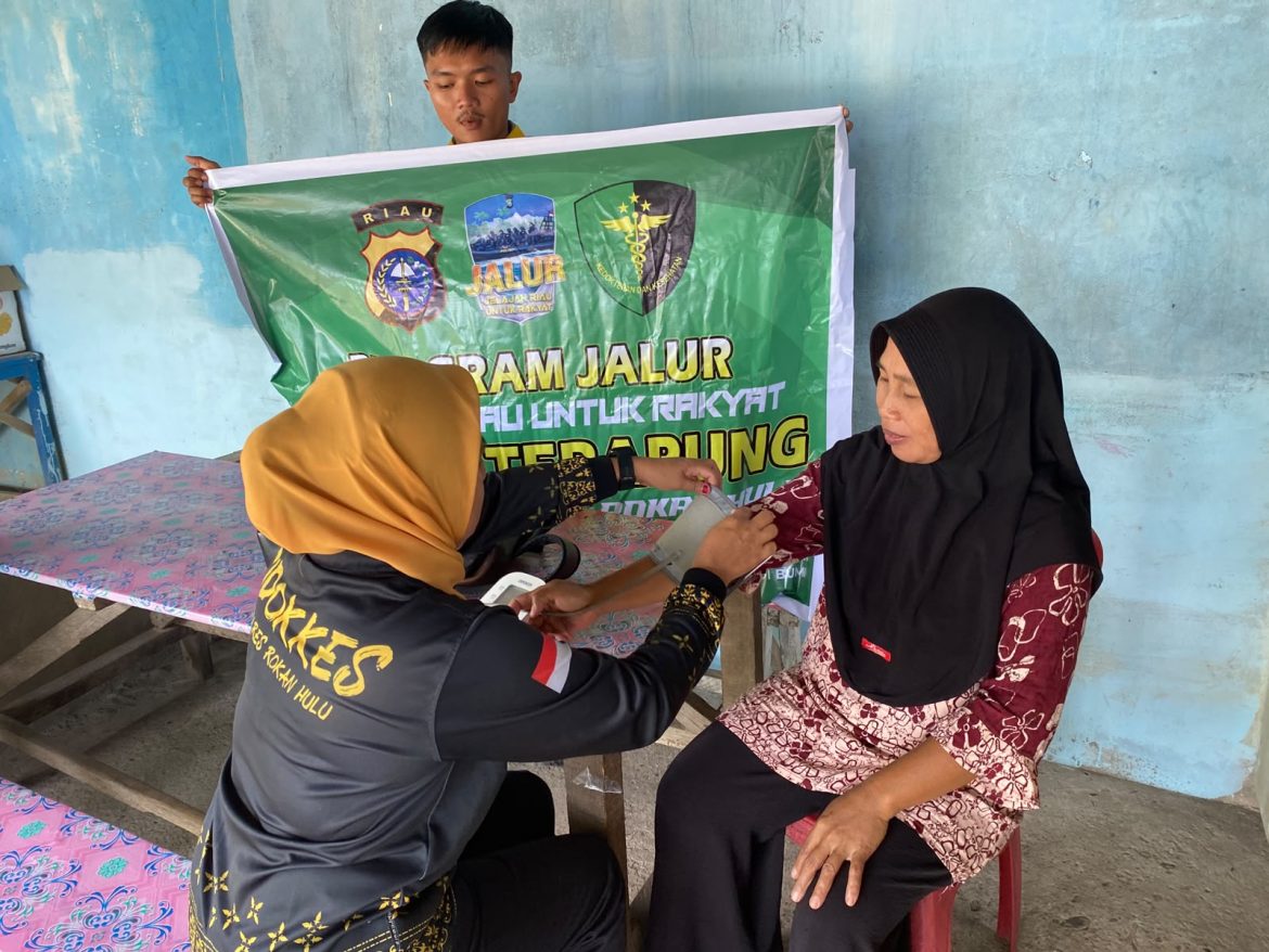 *Lewat Program JALUR,Polres Rohul Hadirkan Pelayanan Kesehatan Gratis Bagi Warga Pesisir Sungai Batang Lubuh*